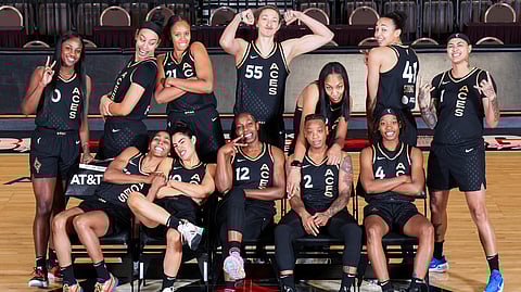 The Las Vegas Aces goof around at their pre-playoffs team photo shoot.