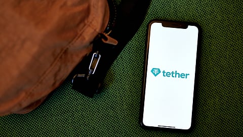 The Tether logo on a smartphone arranged in the Brooklyn borough of New York, US, on Thursday, Nov. 17, 2022.