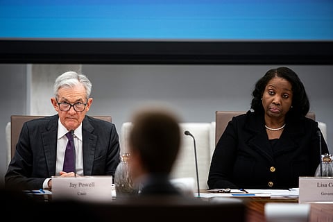 Jerome Powell, chairman of the US Federal Reserve, left, and Lisa Cook, governor of the US Federal Reserve, during the Federal Reserve Board open meeting in Washington, DC, US, on Wednesday, June 25, 2025.