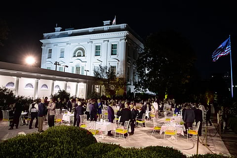 Attendees during a dinner with cabinet members and members of Congress, in the Rose Garden of the White House in Washington, DC, US, on Friday, Sept. 5, 2025.