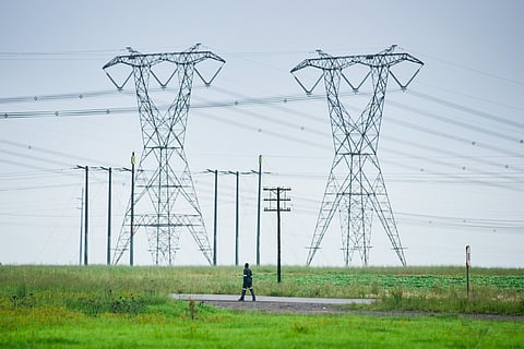 Electricity pylons near the Eskom Holdings SOC Ltd. Kendal coal-fired power plant in Mpumalanga.