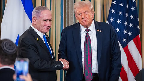 US President Donald Trump, right, and Benjamin Netanyahu, Israel's prime minister, shake hands.