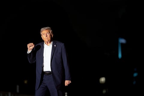 US President Donald Trump on the South Lawn of the White House after arriving on Marine One in Washington, DC, US, on Tuesday, Oct. 14, 2025. Trump used a one-day tour of Israel and Egypt to soak in the praise from fellow leaders and lay out a vision for broader Middle East peace after the success of US-led mediation efforts to end the fighting in Gaza.