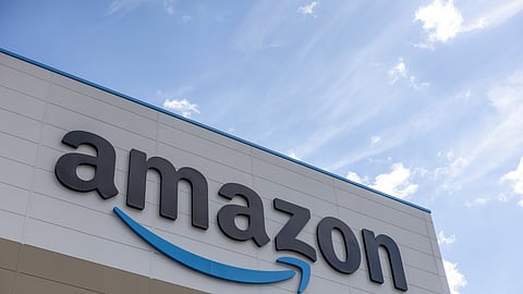 An Amazon.com Inc. logo at an advanced fulfilment centre in Dartford, UK, on Monday, July 7, 2025. Amazon.com’s big Prime Day summer sale kicks off Tuesday.