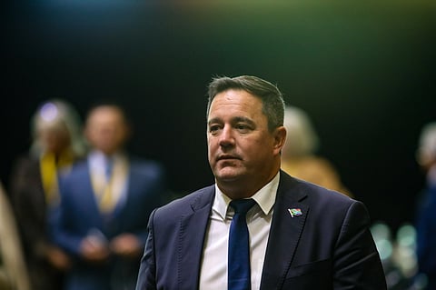John Steenhuisen, leader of the Democratic Alliance (DA), center, at the first sitting of parliament following the election at the Cape Town International Convention Center in Cape Town, South Africa, on Friday, June 14, 2024. Talks between South African political parties on forming a new government extended late into the night on Thursday.