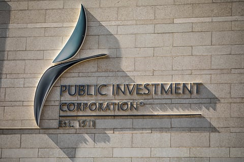 Signage for the Public Investment Corporation on the exterior of a commercial office building in Pretoria, South Africa