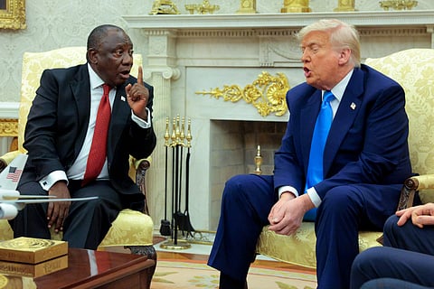 WASHINGTON, DC - MAY 21: President of South Africa Cyril Ramaphosa (L) and U.S. President Donald Trump exchange words during a meeting in the Oval Office of the White House on May 21, 2025 in Washington, DC. Relations between the two countries have been strained since Trump signed an executive order in February that claimed white South Africans are the victims of government land confiscation and race-based “genocide” while admitting some of those Afrikaners as refugees to the United States. Trump also halted all foreign aid to South Africa and expelled the country’s Ambassador to the U.S. Ebrahim Rasool. (Photo by Chip Somodevilla/Getty Images)