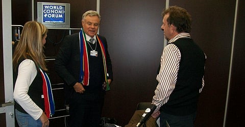 Koos Bekker (centre) after an interview in Davos, 2012.