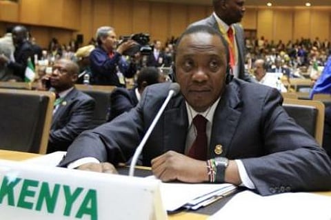 Kenya's President Uhuru Kenyatta attends the opening ceremony of the 22nd Ordinary Session of the African Union summit in Ethiopia's capital Addis Ababa, January 30, 2014.    REUTERS/Tiksa Negeri