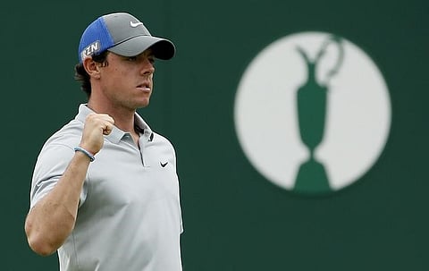 McIlroy holds nerve to win Open 2014 by two strokes