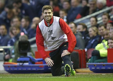 Liverpool's Steven Gerrard warms up during their English Premier League soccer match against Stoke City at Anfield in Liverpool, northern England November 29, 2014. REUTERS/Phil Noble