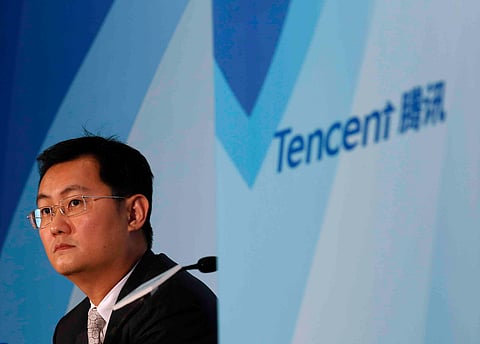 Tencent Chairman & Chief Executive Officer Pony Ma attends a news conference announcing the company's results in Hong Kong March 18, 2015. Tencent Holdings Ltd , China's biggest social network and online entertainment firm, posted a 51 percent gain in fourth-quarter net income, missing estimates, as sharing and content costs took a bite out of healthy revenue growth. REUTERS/Bobby Yip
