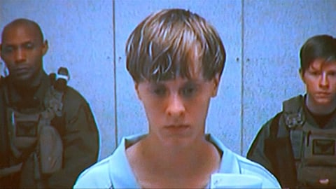 Dylann Storm Roof appears by closed-circuit television at his bond hearing in Charleston, South Carolina June 19, 2015 in a still image from video. A 21-year-old white man has been charged with nine counts of murder in connection with an attack on a historic black South Carolina church, police said on Friday, and media reports said he had hoped to incite a race war in the United States. REUTERS/POOL