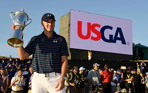Jun 21, 2015; University Place, WA, USA; Jordan Spieth poses for a photo with the U.S. Open Championship Trophy after winning the 2015 U.S. Open golf tournament at Chambers Bay. Mandatory Credit: John David Mercer-USA TODAY Sports