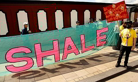 Anti-fracking protesters demonstrate outside County Hall in Preston, Britain June 23, 2015. Lancashire County Council is debating an application by shale gas firm Cuadrilla Resources to frack on the Fylde coast, local media reported. REUTERS/Phil Noble