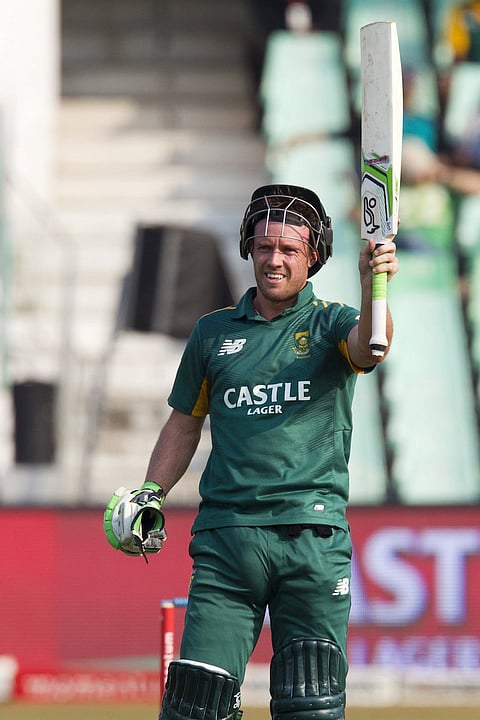 South Africa's AB de Villiers celebrates scoring a half century during the 3rd One Day International cricket match against New Zealand in Durban, August 26, 2015. REUTERS/Rogan Ward