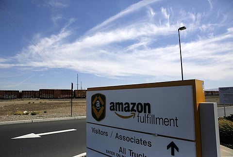A sign is seen at an Amazon Fulfilment Center in Tracy, California, August 3, 2015. REUTERS/Robert Galbraith
