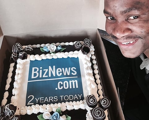 Isaac, manager of Fourno's Rosebank (where many important early Biznews.com meetings were held) with our birthday cake. We like celebrating and turing two on the same day Barack Obama has his birthday is reason enough.