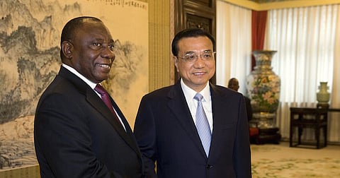 South Africa Deputy President Cyril Ramaphosa (L) shakes hands with Chinese Premier Li Keqiang during a meeting at the Zhongnanhai leadership compound in Beijing, China July 14, 2015. REUTERS/Ng Han Guan/Pool