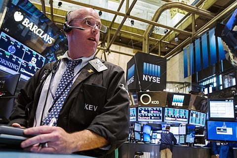 Traders work on the floor of the New York Stock Exchange shortly before the closing bell in New York August 26, 2015. Wall Street was sharply higher on Wednesday while European shares and commodities prices fell as investors balanced strong U.S. economic data and interest rate comments with fears about China's slowing economy. REUTERS/Lucas Jackson