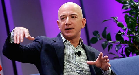 Amazon President, Chairman and CEO Jeff Bezos speaks at the Business Insider's "Ignition Future of Digital" conference in New York City in this file photo from December 2, 2014. With a $200 million-plus investment to build a rocket manufacturing plant and launch site in Florida, Bezos joins a growing list of billionaire tech moguls looking to profit from a new era in space commerce. REUTERS/Mike Segar/Files