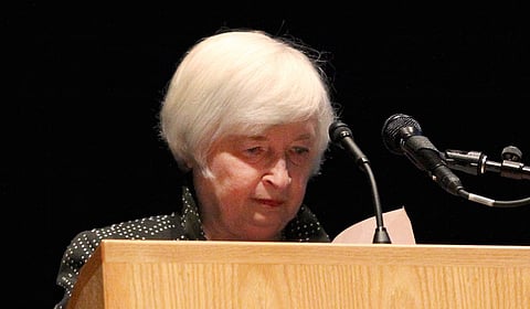 U.S. Federal Reserve Chair Janet Yellen pauses as she looks down at her speech as she struggled to finish at the University of Massachusetts in Amherst, Massachusetts September 24, 2015. Fed chair Janet Yellen was receiving medical attention on Thursday after struggling to finish a speech at the University of Massachusetts at Amherst, coughing and stopping to recompose herself several times before walking off stage. REUTERS/Mary Schwalm