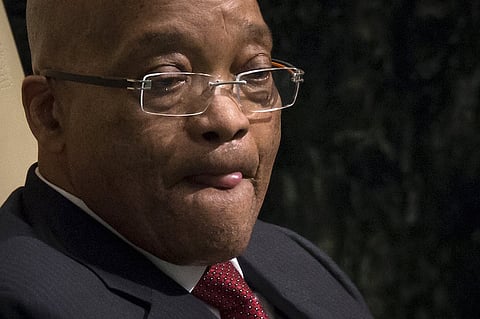 President of South Africa Jacob Zuma sticks out his tongue after as he addressed attendees during the 70th session of the United Nations General Assembly at the U.N. headquarters in New York, September 28, 2015. REUTERS/Carlo Allegri