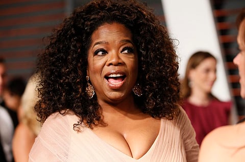 Oprah Winfrey arrives at the 2015 Vanity Fair Oscar Party in Beverly Hills, California in this February 22, 2015 file photo. Talk-show host and media magnate Winfrey is buying a 10 percent stake in Weight Watchers Interantional Inc in a vote of confidence for a company that is helping her and millions of others lose weight. REUTERS/Danny Moloshok/Files