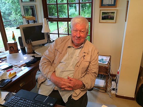 Author RW "Bill" Johnson behind his desk at home in Cape Town. His best seller How long will SA survive? has topped the non fiction lists for the past year.