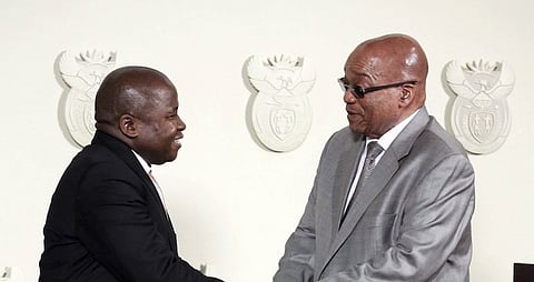 South Africa's President Jacob Zuma (R) congratulates new Finance Minister David van Rooyen during a ceremony at the Union building in Pretoria, December 10, 2015. REUTERS/Sydney Seshibedi        EDITORIAL USE ONLY. NO RESALES. NO ARCHIVE