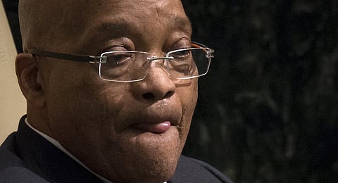 President of South Africa Jacob Zuma sticks out his tongue after as he addressed attendees during the 70th session of the United Nations General Assembly at the U.N. headquarters in New York, September 28, 2015.  REUTERS/Carlo Allegri