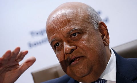 South Africa's Finance Minister, Pravin Gordhan gestures during a media briefing after he was reappointed to the position by President Jacob Zuma in Pretoria, South Africa. REUTERS/Siphiwe Sibeko