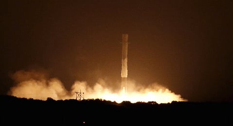 The first stage of the SpaceX Falcon 9 rocket returns to land at Cape Canaveral Air Force Station, on the launcher's first mission since a June failure, in Cape Canaveral, Florida. December 21, 2015. The rocket carried a payload of eleven satellites owned by Orbcomm, a New Jersey-based communications company. REUTERS/Joe Skipper