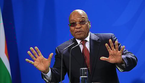 File Photo. Jacob Zuma, South Africa's president, gestures as he speaks during a news conference with Angela Merkel, Germany's chancellor, at the Chancellery in Berlin, Germany, on Tuesday, Nov. 10, 2015. Photographer: Krisztian Bocsi/Bloomberg