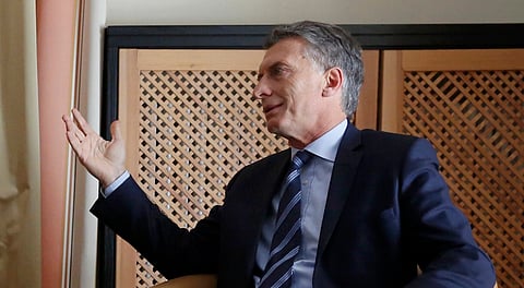 Argentina's President Mauricio Macri speaks with British Prime Minister David Cameron (unseen) as they meet in hotel Belvedere during the annual meeting of the World Economic Forum (WEF) in Davos, Switzerland January 21, 2016. REUTERS/Ruben Sprich