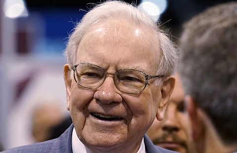 Berkshire Hathaway CEO Warren Buffett talks to reporters prior to the Berkshire annual meeting in Omaha, Nebraska in this May 2, 2015 file photo. Buffett has signed on as an advisor on the eighth season of NBC's "The Celebrity Apprentice," more than a decade after advising new host Arnold Schwarzenegger during his successful 2003 run to become California's governor. REUTERS/Rick Wilking/Files
