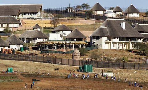 A general view of the Nkandla home (behind the huts) of South Africa's President Jacob Zuma in Nkandla in this August 2, 2012 file photo. REUTERS/Rogan Ward