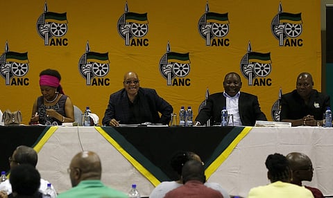 South Africa's President and African National Congress (ANC) party president Jacob Zuma, flanked by National Assembly Speaker Baleka Mbete, Deputy President Cyril Ramaphosa, ANC Treasury General Zweli Mkhize, reacts ahead of the party's National Executive Committee (NEC) three-day meeting in Pretoria, South Africa. REUTERS/Siphiwe Sibeko
