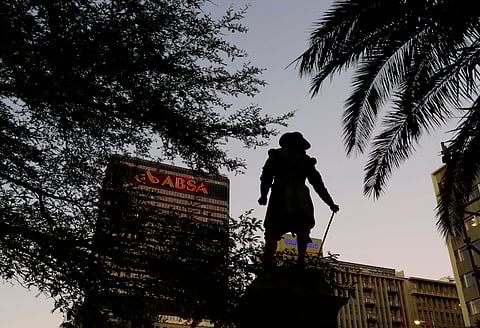 A statue of colonial Dutch governor Jan van Riebeeck stands before the headquarters of Barclay's South African subsidiary Absa bank in Cape Town, March 1, 2016. Barclays Plc reported a 2 percent fall in full-year adjusted pre-tax profit on Tuesday and unveiled plans to simplify its UK & international operations to boost returns and cut costs, primarily by exiting its historic African business. REUTERS/Mike Hutchings