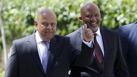 South Africa's Deputy Finance Minister Mcebisi Jonas (R) arrives with Finance Minister Pravin Gordhan for Gordhan's 2016 Budget address in Cape Town in this February 24, 2016 file photo. REUTERS/Mike Hutchings/Files