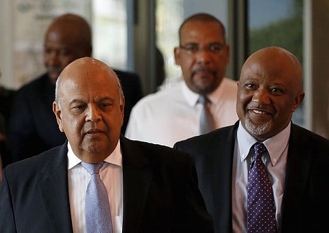 South Africa's Deputy Finance Minister Mcebisi Jonas (R) and Finance Minister Pravin Gordhan arrive for a media briefing in Pretoria in this December 14, 2015 file photo. REUTERS/Siphiwe Sibeko/Files