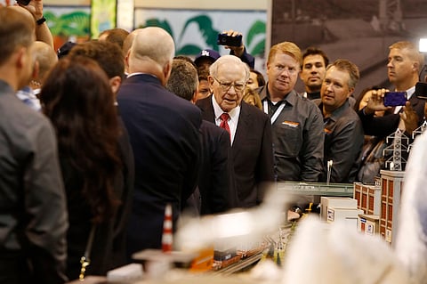 Warren Buffett stops at the BNSF Railway booth in the exhibit hall during the Berkshire Hathaway Annual Shareholders Meeting at the CenturyLink Center in Omaha, Nebraska, U.S. April 30, 2016. REUTERS/Ryan Henriksen
