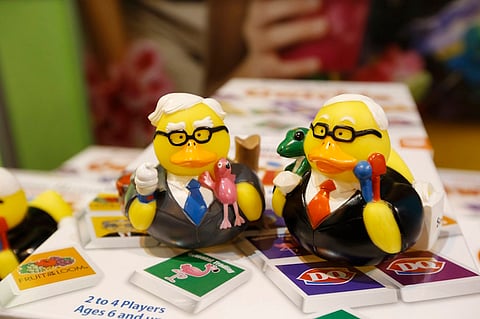 Commemorative items for sale are on display at the Oriental Trading Company booth during the Berkshire Hathaway Annual Shareholders Meeting at the CenturyLink Center in Omaha, Nebraska, U.S. April 30, 2016. REUTERS/Ryan Henriksen