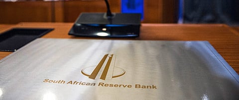 The logo of the South African Reserve Bank sits on a lecturn during a news conference by the Governor Lesetja Kganyago to announce interest rates on Jan. 28, 2016. Photographer: Waldo Swiegers/Bloomberg
