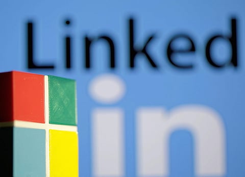 A 3D printed logo of Microsoft is seen in front of a displayed LinkedIn logo in this illustration taken, June 13, 2016. REUTERS/Dado Ruvic/Illustration