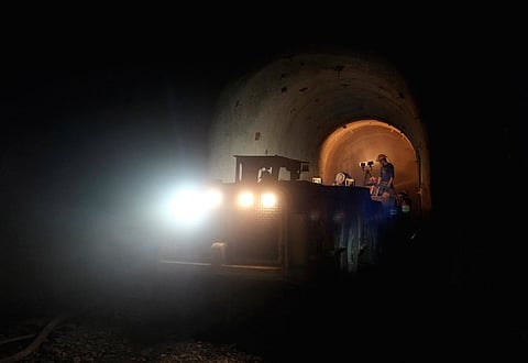 Miners are seen working at the at the Colquiri mine, in Bolivia. REUTERS/David Mercado