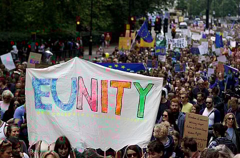 People hold banners during a 'March for Europe' demonstration against Britain's decision to leave the European Union, in central London, Britain July 2, 2016. Britain voted to leave the European Union in the EU Brexit referendum. REUTERS/Tom Jacobs