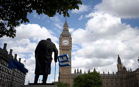 A balloon is tied to the Winston Churchill statue in Parliament Square during a 'March for Europe' demonstration against Britain's decision to leave the European Union, in central London, Britain. Britain voted to leave the European Union in the EU Brexit referendum. REUTERS/Neil Hall