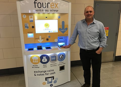 Jeff Paterson, co-founder of Fourex, at one of the foreign exchange machines in London.