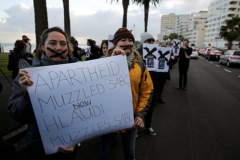 Demonstrators protest against the decision by public broadcaster South African Broadcasting Corporation (SABC) that it would not broadcast scenes of violent protest, in Cape Town, South Africa, July 1, 2016. REUTERS/Mike Hutchings